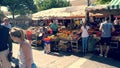 Nice food market people passing by at the market.